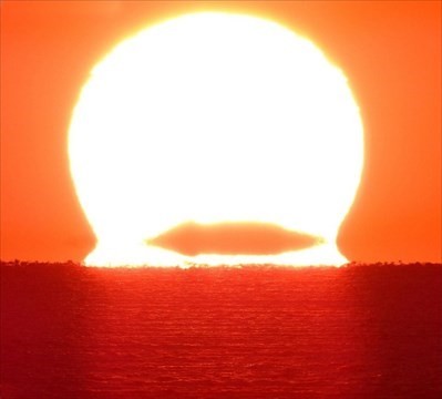 Il sole "Omega" in un tramonto a Punta Prosciutto, ottobre 2020 - Scatto di Carlo Bizzini